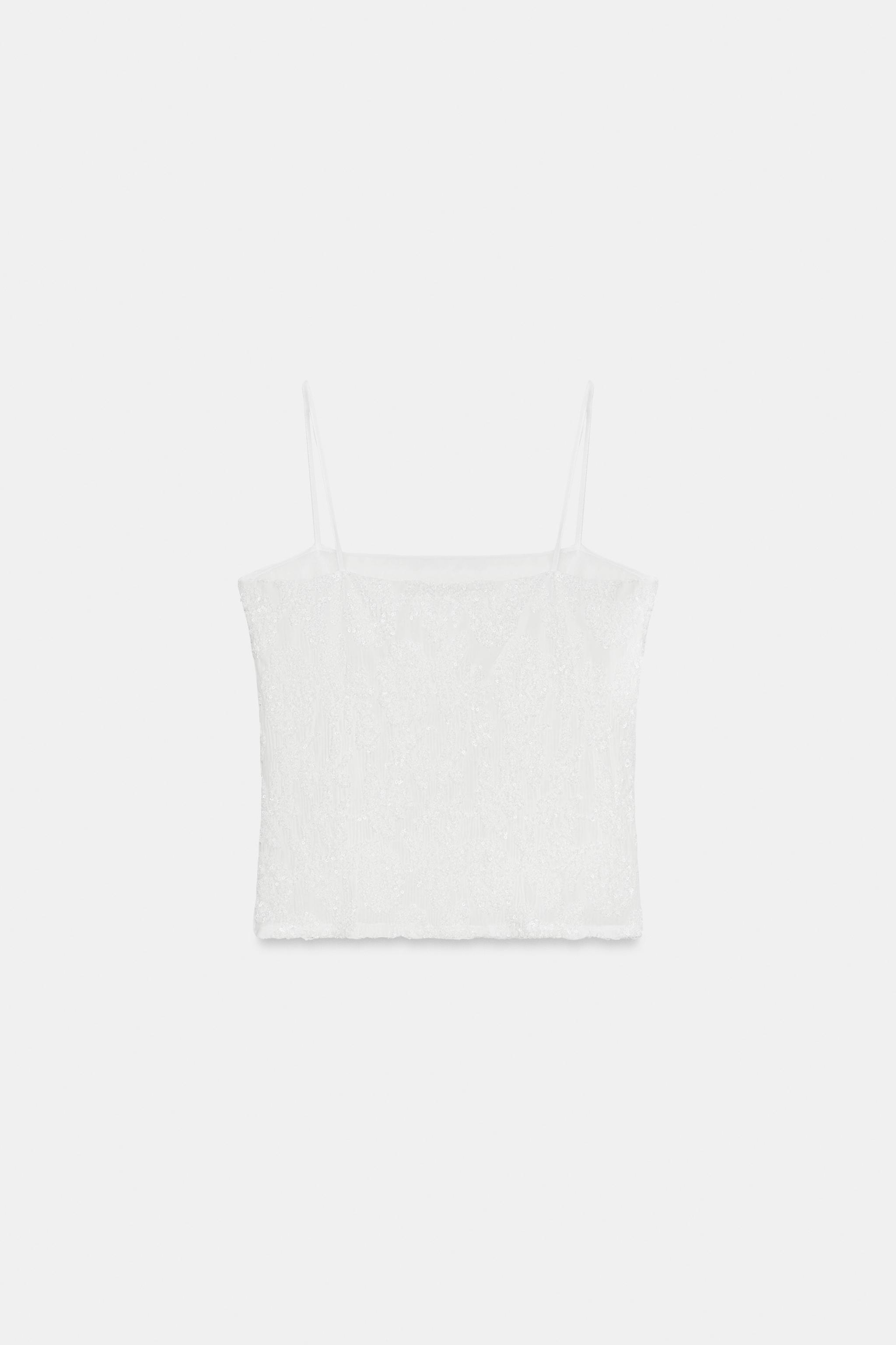 TOP BRODÉ À PAILLETTES